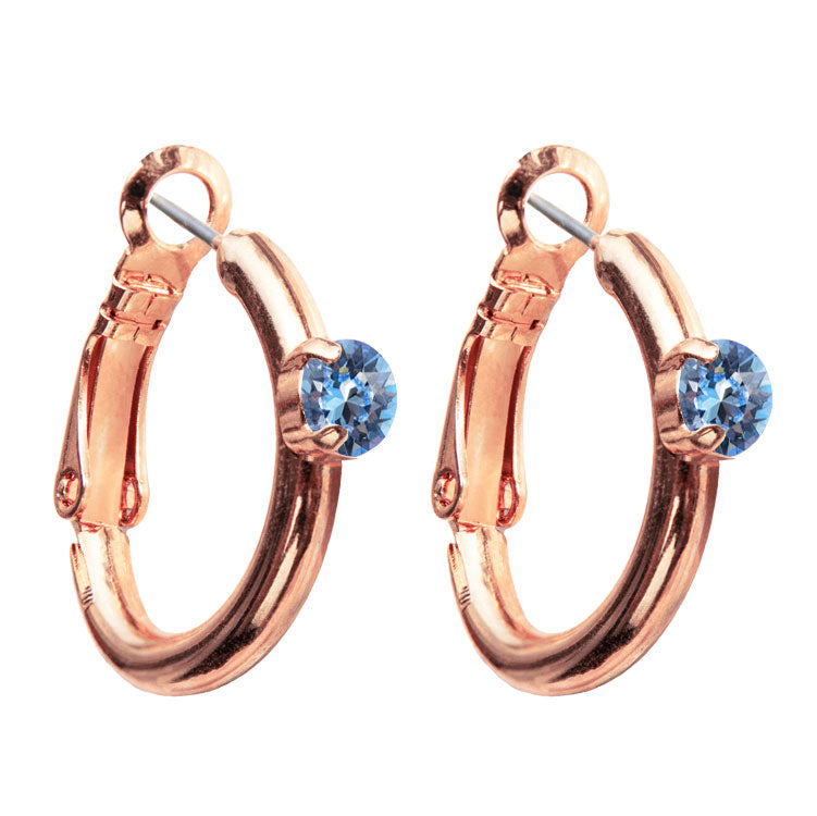 Riņķa Swarovski auskari ar  gaišā safīra kristāliem